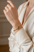 14 karat yellow gold (bangle) Bracelet with sapphire, ruby and diamond – Dutch hallmarked